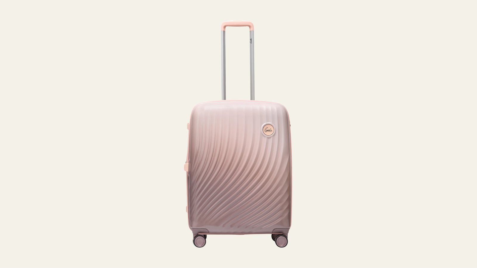 Genie luggage — Scarlette, a blush ombré hardside trolley with a moulded wave texture